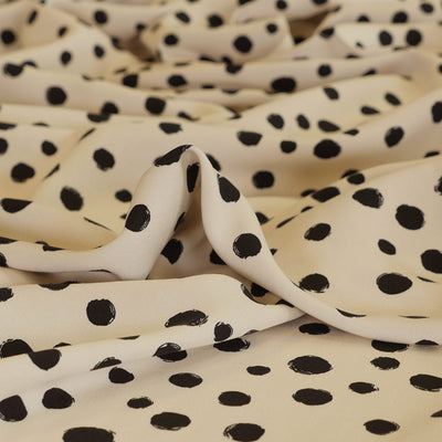 Linz - Parchment Cream Spotty Viscose Woven Twill Fabric Feature Image from Patternsandplains.com