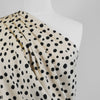 Linz - Parchment Cream Spotty Viscose Woven Twill Fabric Mannequin Close Up Image from Patternsandplains.com