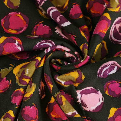 Linz - Pink Planets Viscose Woven Twill Fabric Detail Swirl Image from Patternsandplains.com