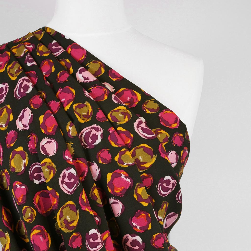 Linz - Pink Planets Viscose Woven Twill Fabric Mannequin Close Up Image from Patternsandplains.com