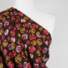 Linz - Pink Planets Viscose Woven Twill Fabric Mannequin Close Up Image from Patternsandplains.com