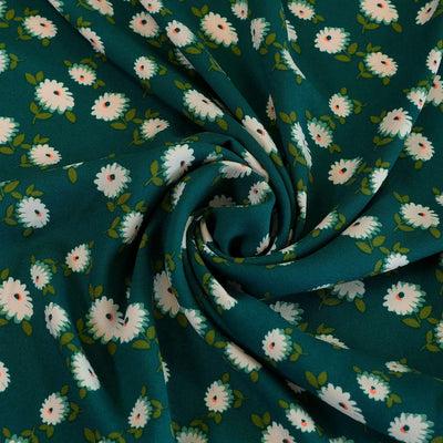 Loire Green Double Daisies Viscose Crepe Fabric Detail Swirl Image from Patternsandplains.com