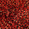 Loire - Red Double Spots Viscose Crepe Fabric Detail Swirl Image from Patternsandplains.com