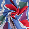 Madison - Blue Pop Flowers Viscose Crepe Woven Fabric Detail Swirl Image from Patternsandplains.com