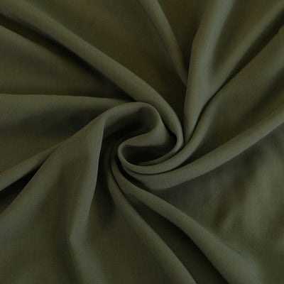 Madison - Sage Green Viscose Crepe Woven Fabric Detail Swirl Image from Patternsandplains.com