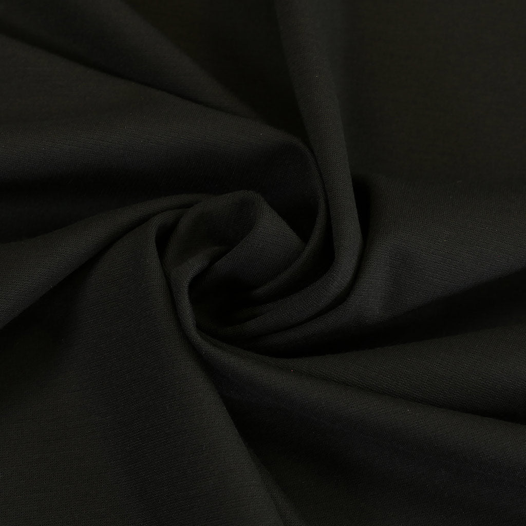 Milan - Black Viscose Rich Ponte de Roma Fabric Detail Swirl Image from Patternsandplains.com