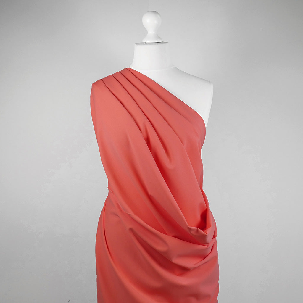 Milan - Light Coral Viscose Rich Ponte de Roma Fabric Mannequin Wide Image from Patternsandplains.com