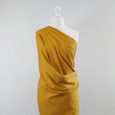 Milan - Saffron Yellow Viscose Rich Ponte de Roma Fabric Mannequin Wide Image from Patternsandplains.com