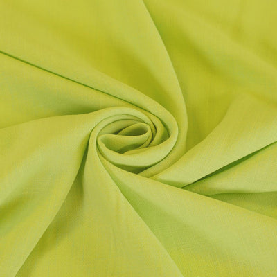 Mons - Bitter Lime Green Viscose Linen Woven Fabric Detail Swirl Image from Patternsandplains.com