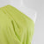 Mons - Bitter Lime Green Viscose Linen Woven Fabric Mannequin Close Up Image from Patternsandplains.com