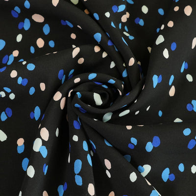 Napa - Black Raindrops Viscose Lawn Woven Fabric Detail Swirl Image from Patternsandplains.com