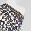 Nassau - Blue Geometric Border Viscose Slub Woven Fabric Mannequin Close Up Image from Patternsandplains.com