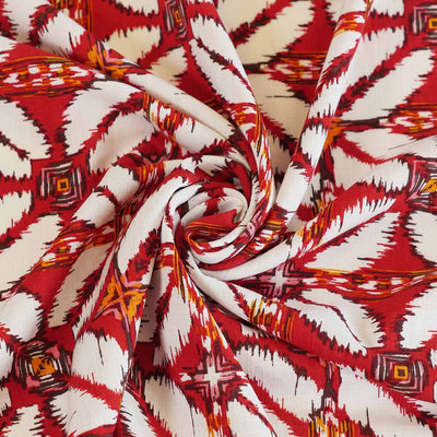 Nassau - Red Geometric Border Viscose Slub Woven Fabric Detail Swirl Image from Patternsandplains.com