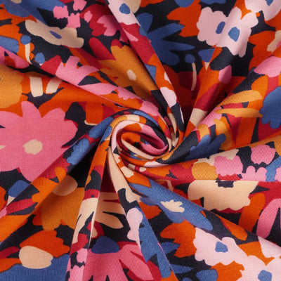 Navy Pop Blossom, Single Jersey Organic Cotton Elastane Fabric by Nerida Hansen Detail Swirl Image from Patternsandplains.com