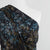 Niva - Navy Sprig Bubble Crepe Woven Fabric Mannequin Close Up Image from Patternsandplains.com