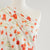 Poppy Reflections Cotton Elastane Single Jersey by Art Gallery Fabrics Mannequin Close Up Image from Patternsandplains.com