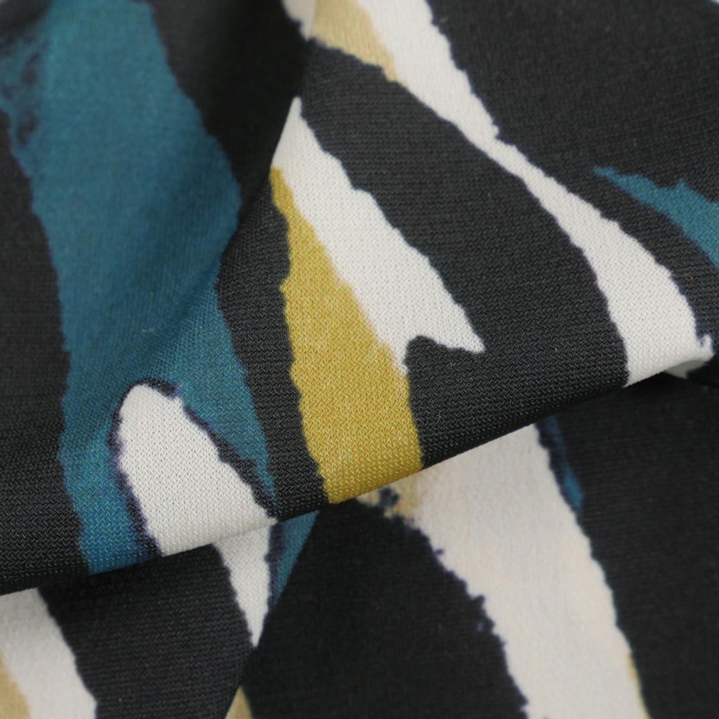 Portia - Teal and Lime Fracture Stretch Jersey Fabric from John Kaldor Feature Image from Patternsandplains.com