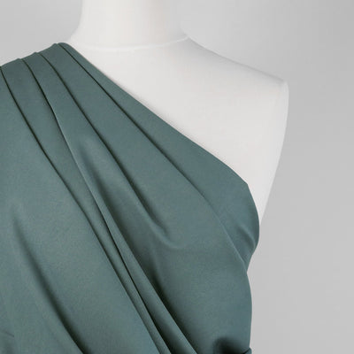 Rome - Steel Teal, Viscose Rich Heavy Ponte de Roma Stretch Fabric Mannequin Close Up Image from Patternsandplains.com