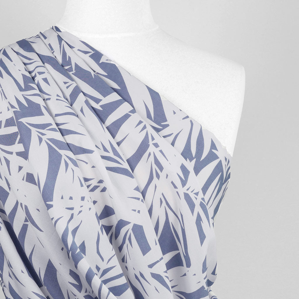 Sierra - Blue Palms Viscose Poplin Woven Fabric Mannequin Close Up Image from Patternsandplains.com