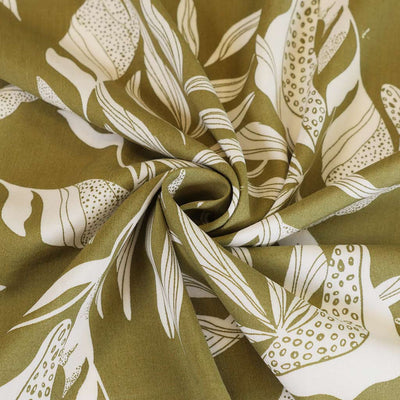Sierra - Green Leaves Viscose Poplin Woven Fabric Detail Swirl Image from Patternsandplains.com