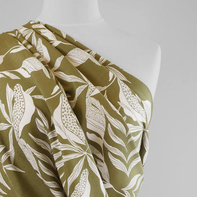 Sierra - Green Leaves Viscose Poplin Woven Fabric Mannequin Close Up Image from Patternsandplains.com