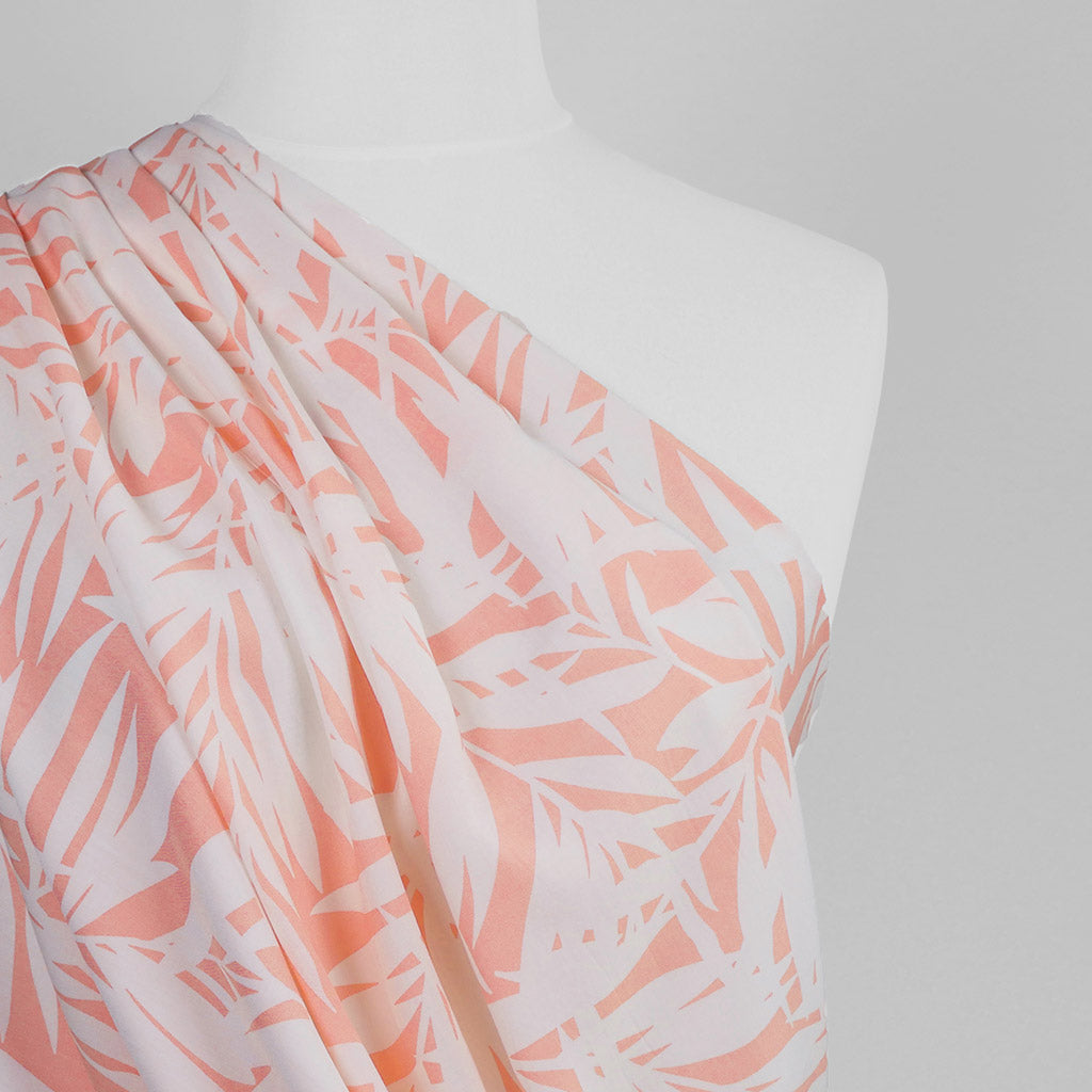 Sierra -  Pink Peach Palms Viscose Poplin Woven Fabric Mannequin Close Up Image from Patternsandplains.com