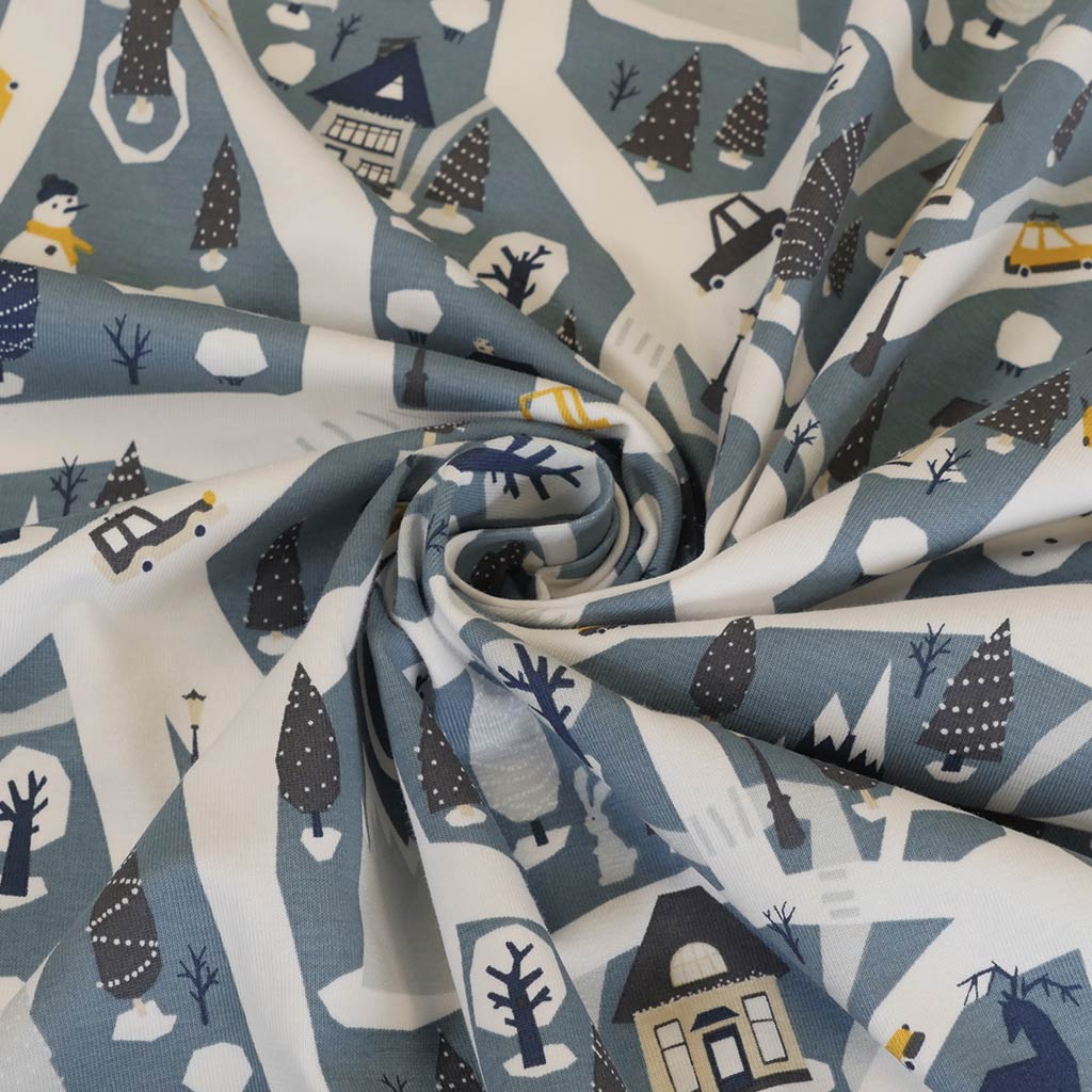 Arizona - Dusty Blue Winter Village, Single Jersey Cotton Elastane Print Fabric Detail Swirl Image from Patternsandplains.com