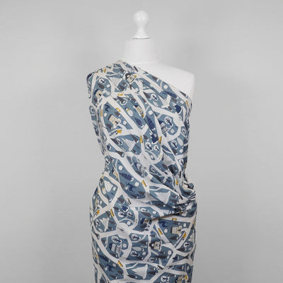Arizona - Dusty Blue Winter Village, Single Jersey Cotton Elastane Print Fabric Mannequin Wide Image from Patternsandplains.com