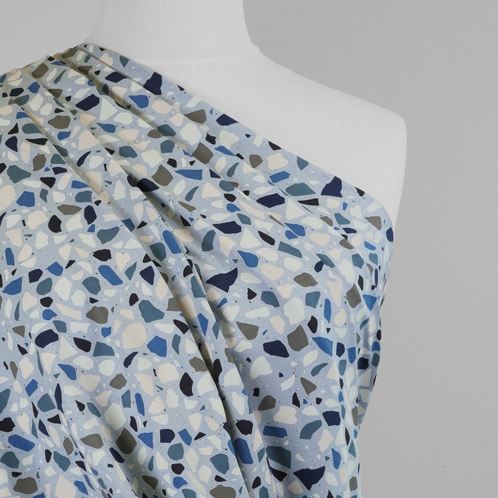 Arizona - Soft Blue Terrazzo Cotton Elastane Single Jersey Fabric Mannequin Close Up Image from Patternsandplains.com