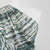 Aruba - Green Shoreline Stripe Viscose Crinkle Fabric Mannequin Close Up Image from Patternsandplains.com