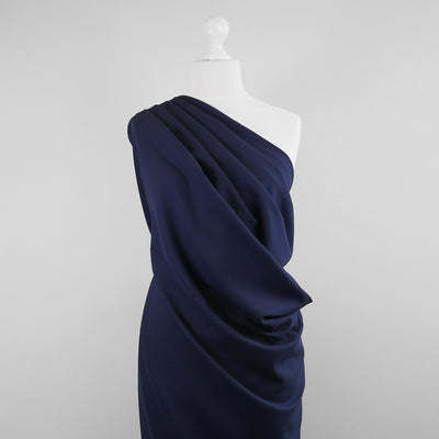 Bloomsbury - Light Navy Crepe Stretch Woven Suiting Fabric Mannequin Wide Image from Patternsandplains.com