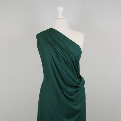 Camas - Pine Green Viscose Elastane Single Jersey Fabric Mannequin Wide Image from Patternsandplains.com