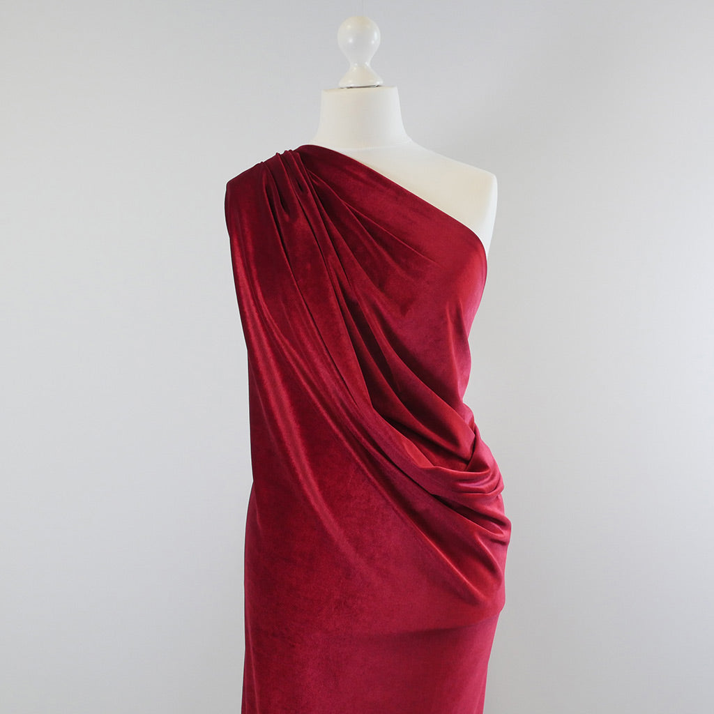 Carlotta Wine Red Stretch Panne Velvet Jersey Fabric from John Kaldor Mannequin Wide Image from Patternsandplains.com