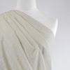 Carolina - Light Cream, Geometric Embroidered Cotton Woven Fabric Mannequin Close Up Image from Patternsandplains.com