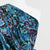 Chelsea - Turquoise Scrolling Leaves Velour Jersey Fabric Mannequin Close Up Image from Patternsandplains.com