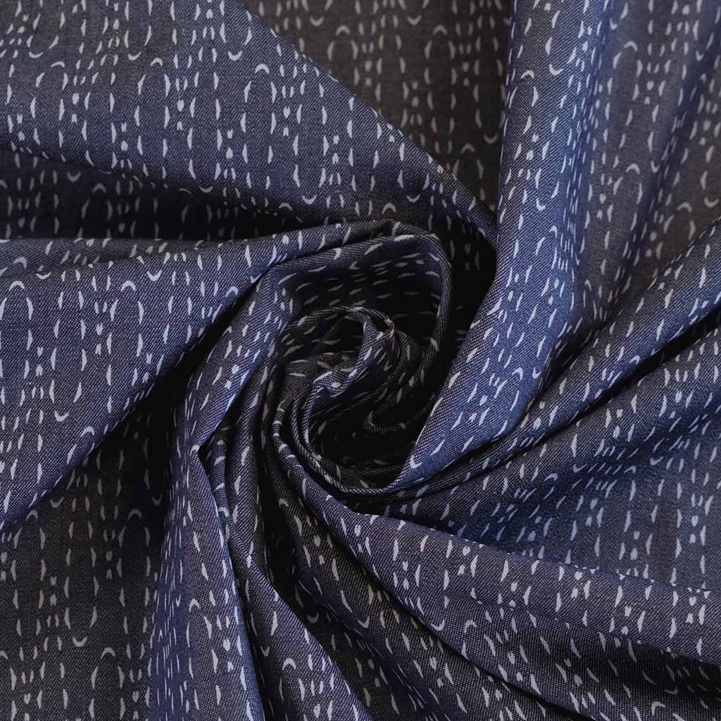 Denim Print Casted Loops Cotton Woven Fabric by Art Gallery Fabrics Detail Swirl Image from Patternsandplains.com