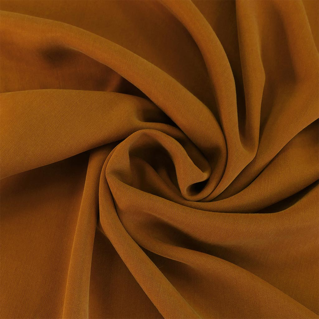 Helsinki - Nutmeg Tencel Sandwashed Woven Twill Fabric Detail Swirl Image from Patternsandplains.com