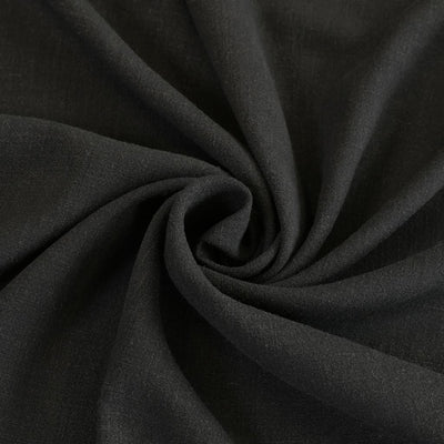 Liege - Black Viscose Linen Silky Noil Woven Fabric Detail Swirl Image from Patternsandplains.com
