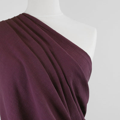 Liege - Damson Viscose Linen Silky Noil Woven Fabric Mannequin Close Up Image from Patternsandplains.com