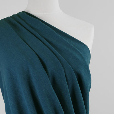 Liege - Harbour Blue Viscose Linen Silky Noil Woven Fabric Mannequin Close Up Image from Patternsandplains.com