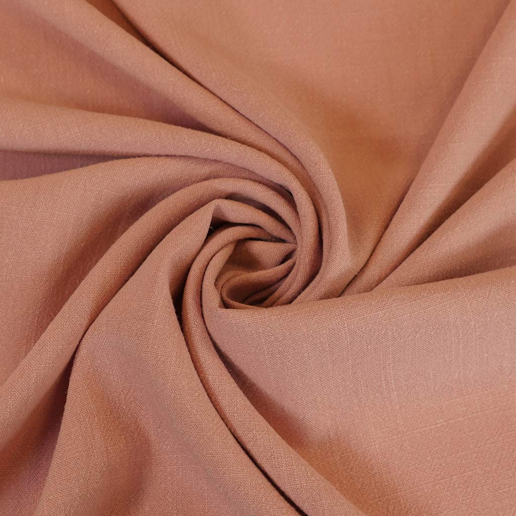 Liege - Melon Pink Viscose Linen Silky Noil Woven Fabric Detail Swirl Image from Patternsandplains.com