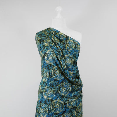 Lima - Petrol Firework Stretch Viscose Woven Twill Fabric Mannequin Wide Image from Patternsandplains.com