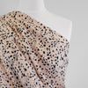 Linz- Shell Pink Animal Elements Viscose Woven Twill Fabric Mannequin Close Up Image from Patternsandplains.com