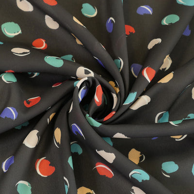 Liza 111766 - Black Sweet Spot Georgette Woven Fabric from John Kaldor Detail Swirl Image from Patternsandplains.com
