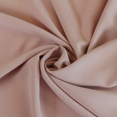 Madison - French Rose Viscose Crepe Woven Fabric Detail Swirl Image from Patternsandplains.com