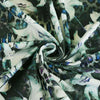 Malibu - Black Lilies Cotton Elastane Single Jersey Fabric Detail Swirl Image from Patternsandplains.com
