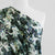 Malibu - Black Lilies Cotton Elastane Single Jersey Fabric Mannequin Close Up Image from Patternsandplains.com