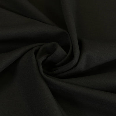 Milan - Black Viscose Rich Ponte de Roma Fabric Detail Swirl Image from Patternsandplains.com