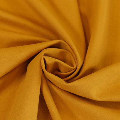 Milan - Saffron Yellow Viscose Rich Ponte de Roma Fabric Detail Swirl Image from Patternsandplains.com