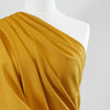 Milan - Saffron Yellow Viscose Rich Ponte de Roma Fabric Mannequin Close Up Image from Patternsandplains.com